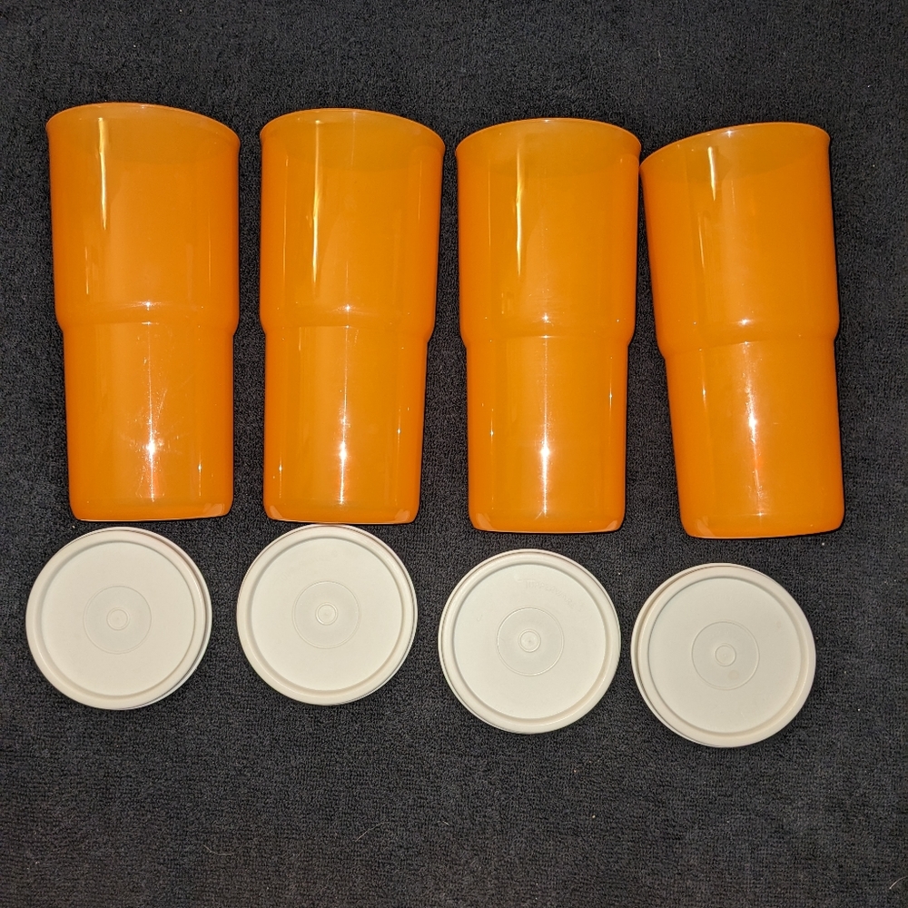 Tupperware stacking tumblers with lids. Orange, Excellent condition.